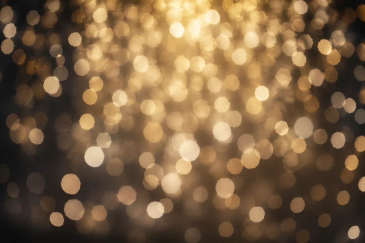 Warm Golden Bokeh Lights on Dark Background