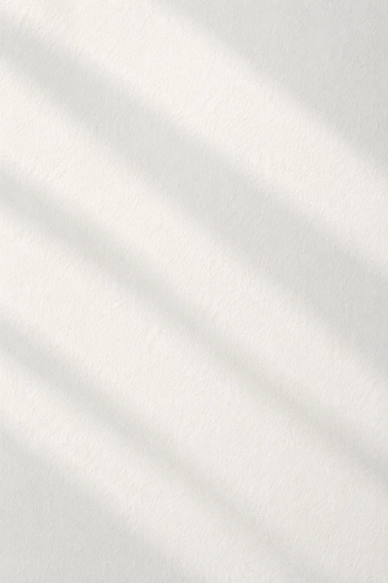 Minimal White Paper Background with Soft Shadows