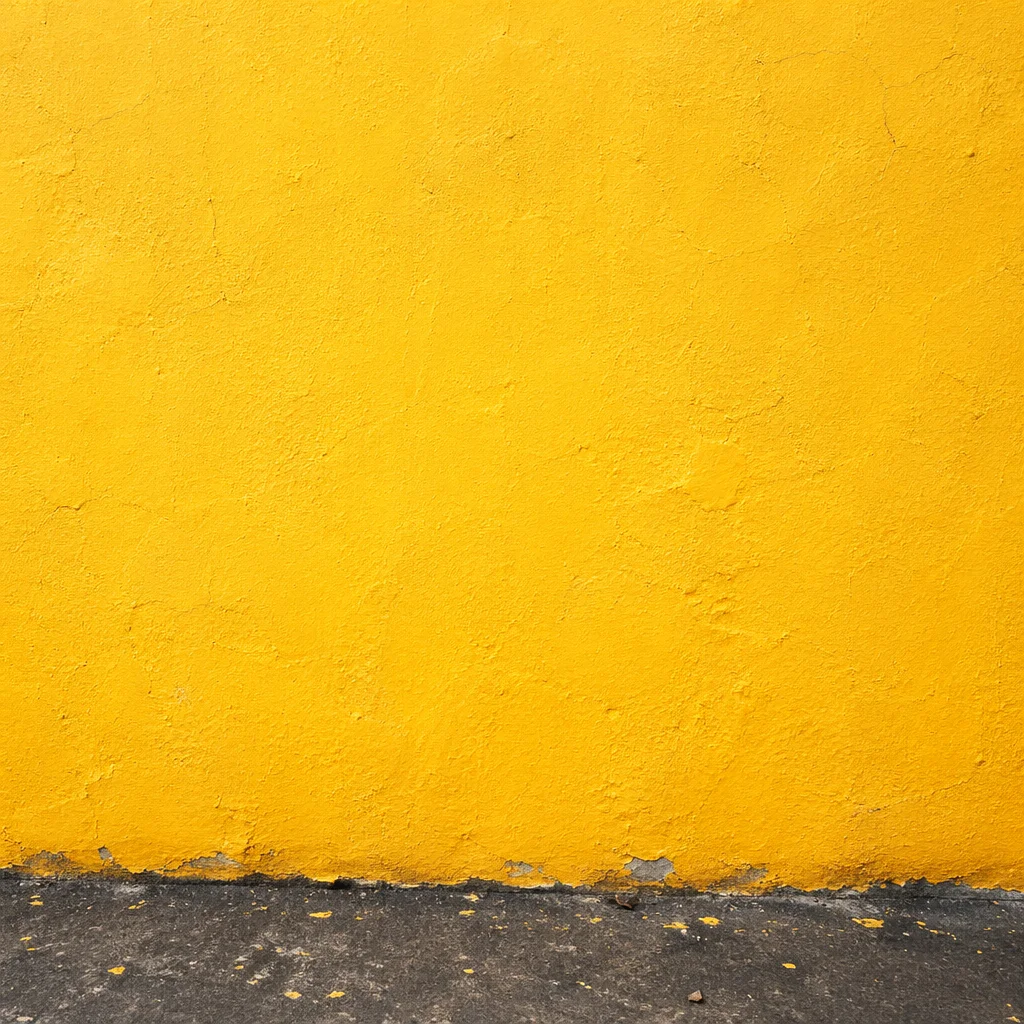 Bright Yellow Stucco Wall Background