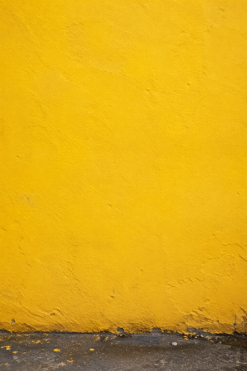 Bright Yellow Stucco Wall Background