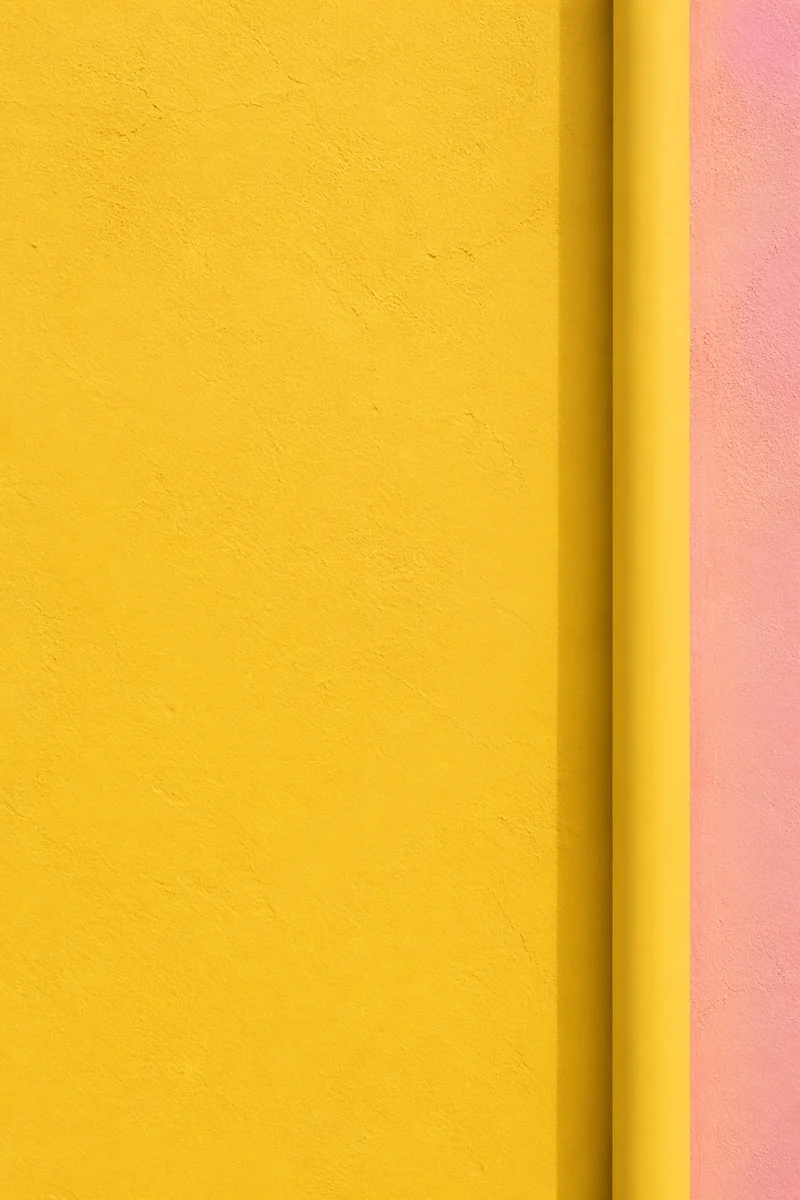 Bright Sunflower Yellow Stucco Wall Background