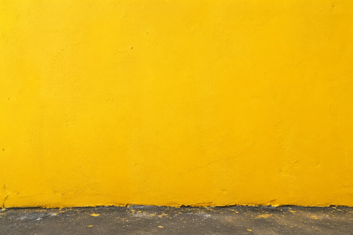 Bright Yellow Stucco Wall Background