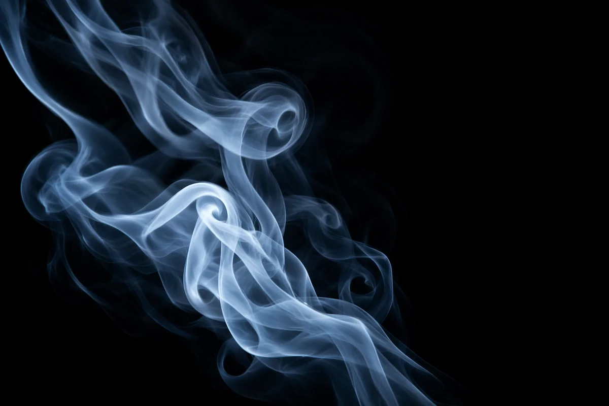 Elegant Blue Smoke Wisps on Black