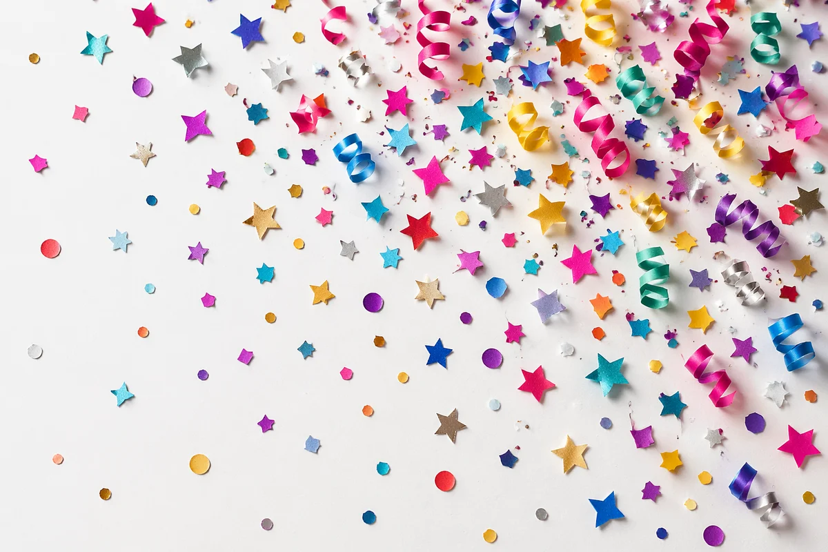 Colorful Confetti Celebration on White Background