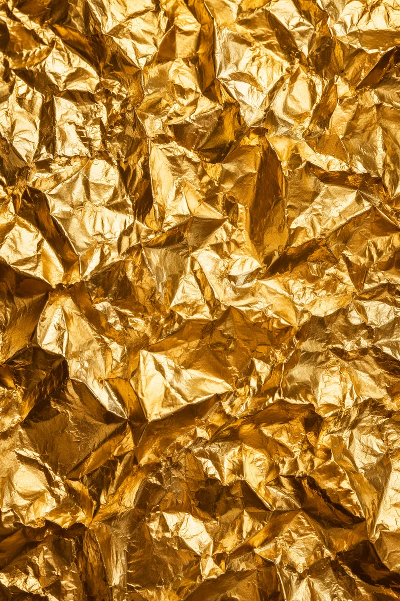Crinkled Gold Foil Luxury Texture Background