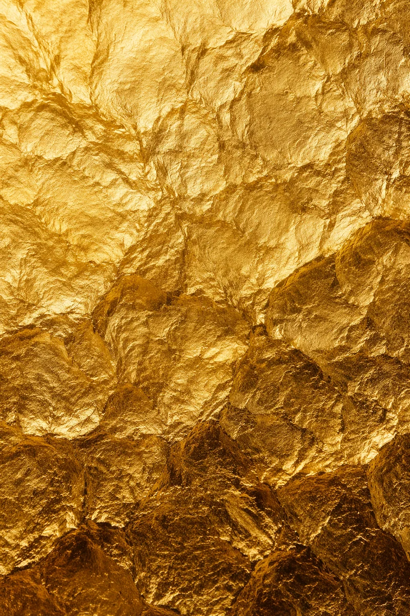 Luxurious Crinkled Gold Foil Texture Background