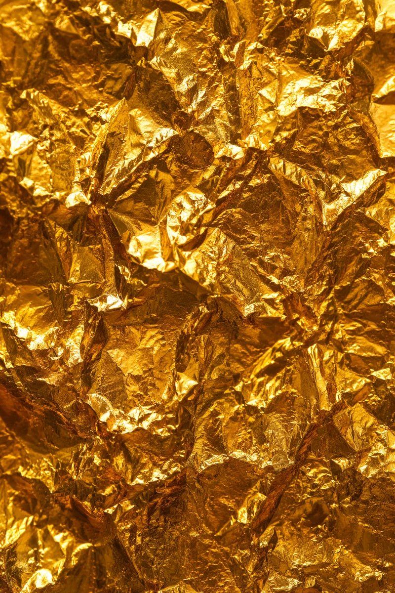 Crinkled Gold Foil Luxury Background Texture
