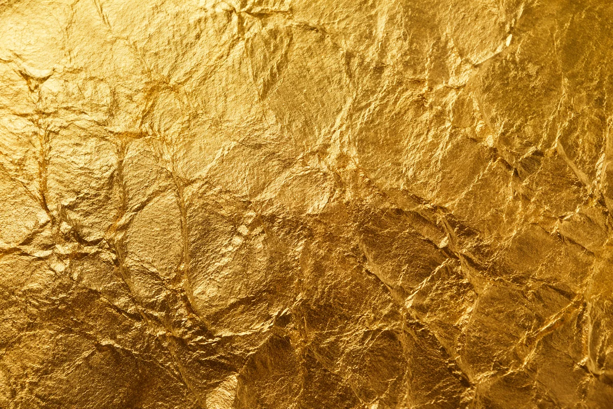 Luxurious Crinkled Gold Foil Texture Background