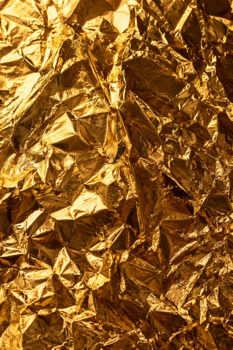 Crinkled Gold Foil Luxury Texture Background