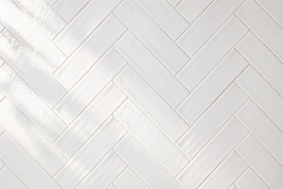 Clean White Herringbone Tile Background