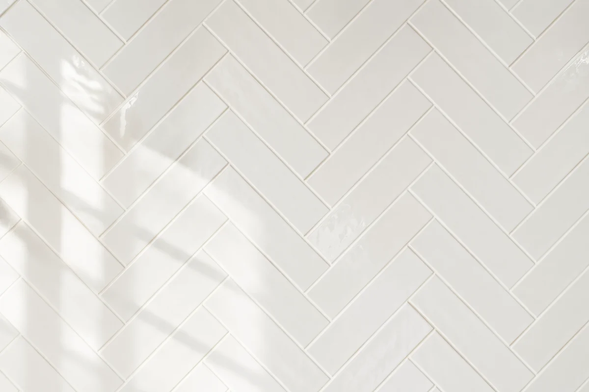 Clean White Herringbone Tile Background