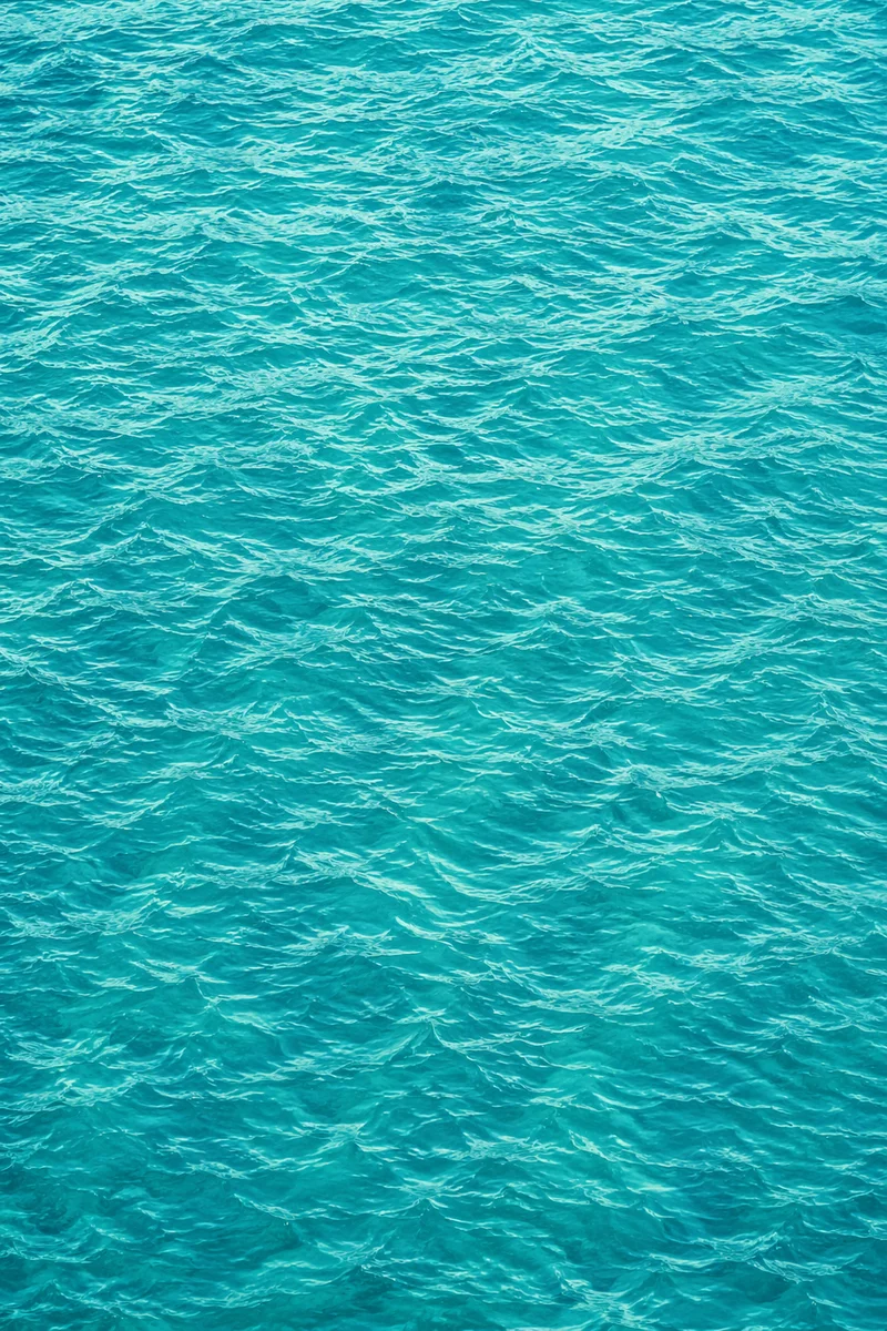 Turquoise Ocean Ripple Texture Background