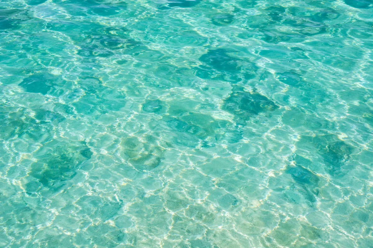 Turquoise Ocean Ripple Texture Background