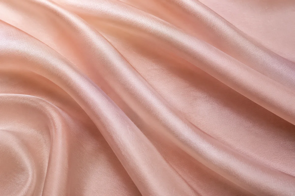 Elegant Champagne Pink Silk Fold Background