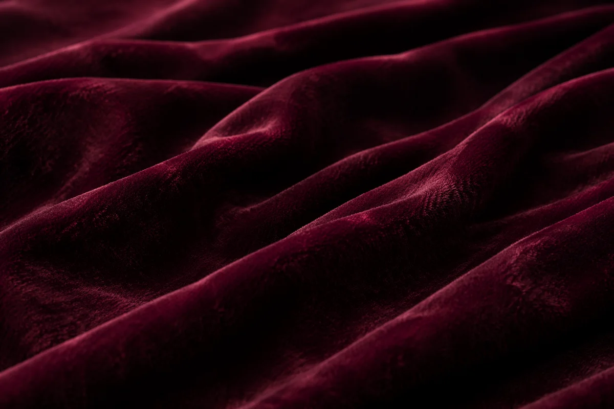 Deep Burgundy Velvet Folded Texture Background