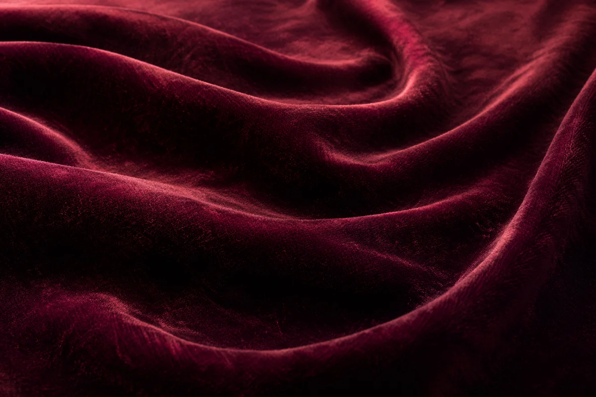 Deep Burgundy Velvet Folded Texture Background