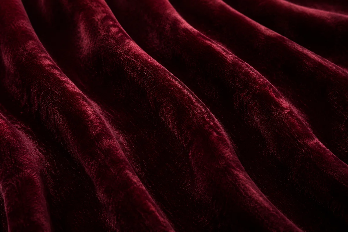 Deep Burgundy Velvet Folded Texture Background