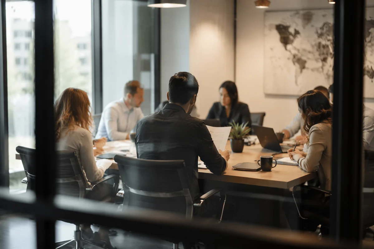 Modern Business Meeting Through Glass Partition