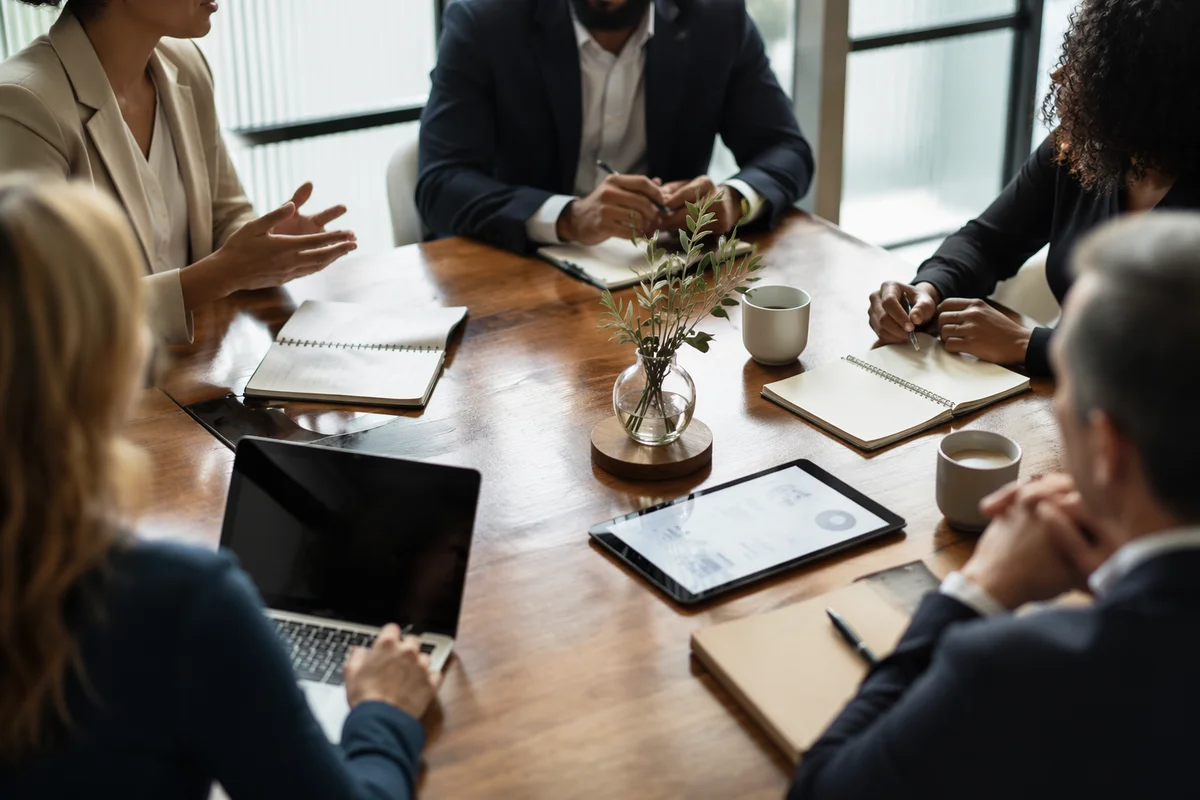 Ethical Business Team Meeting at Conference Table