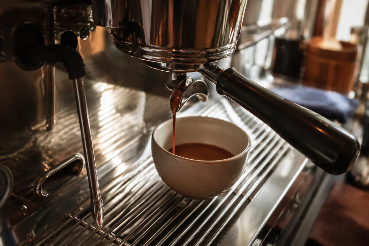 Espresso Pour at Cozy Cafe Counter