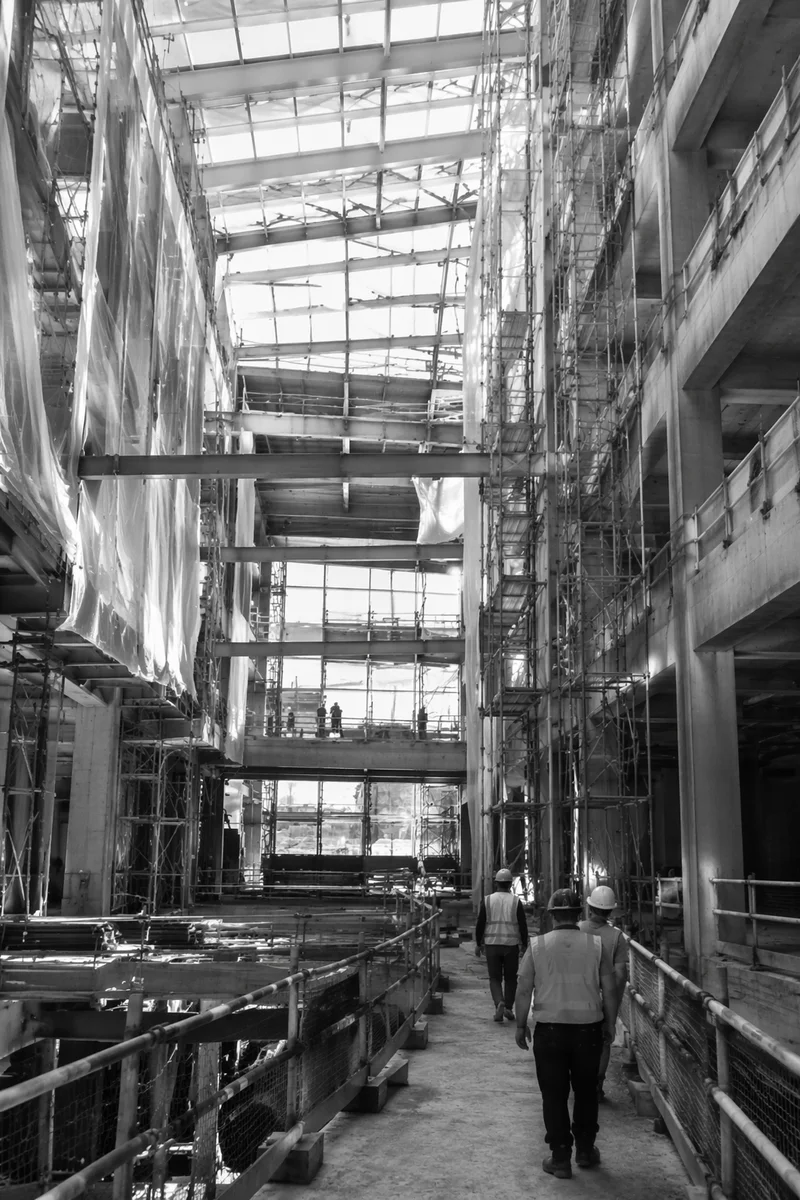 Commercial Construction Atrium Workers in Hard Hats