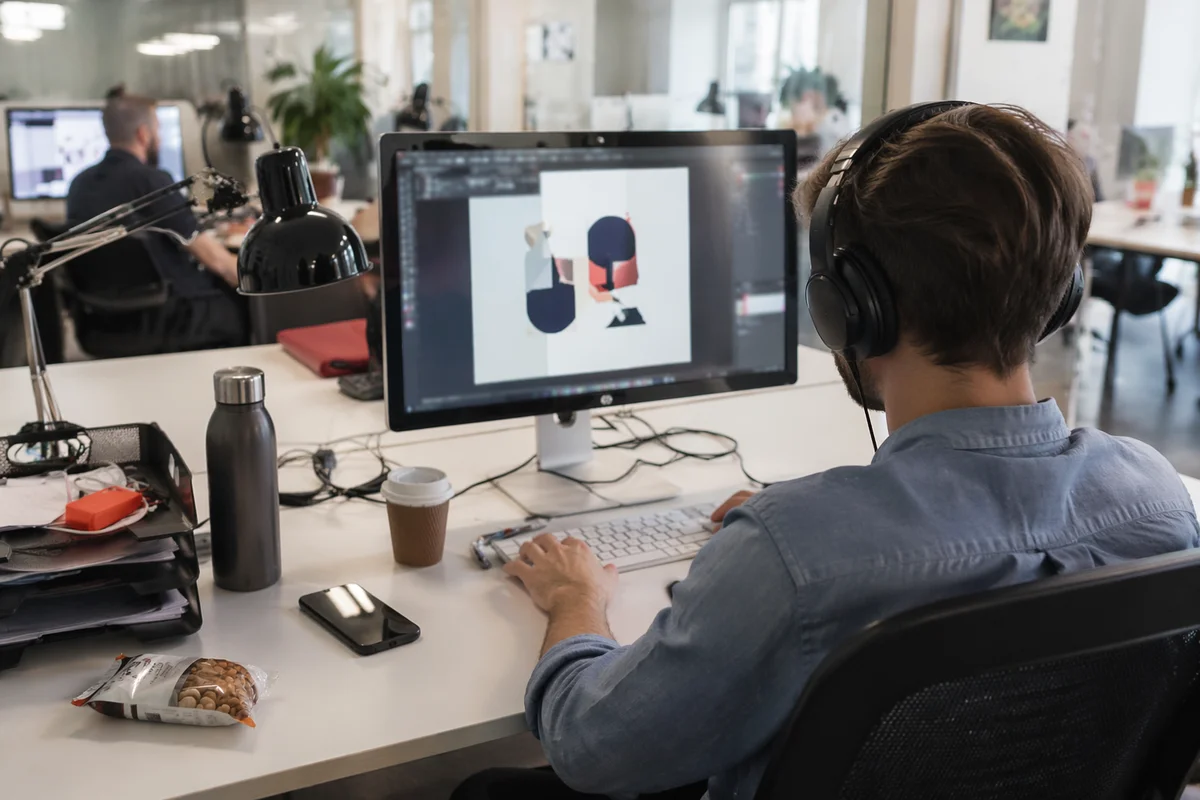 Creative Entrepreneur Working at Startup Office Desk