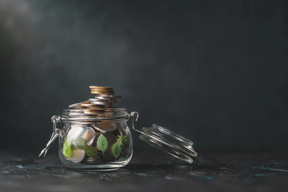 Glass Jar Coin Savings Growth Concept