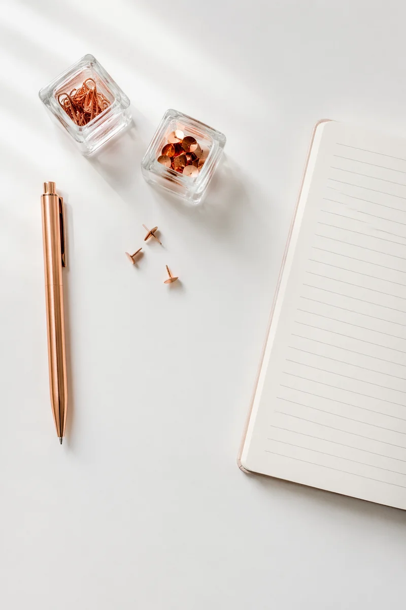 Minimal Organized Desk with Copper Stationery