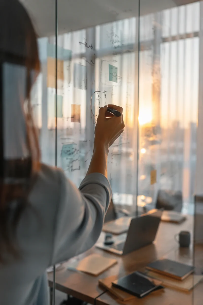Business Strategy Planning on Glass Board