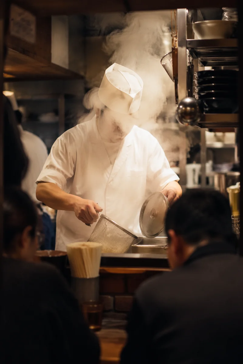 Busy Restaurant Chef in Steamy Kitchen