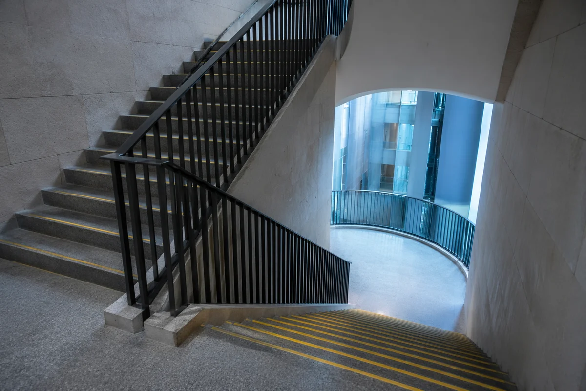 Ascending Staircase in Modern Office Interior