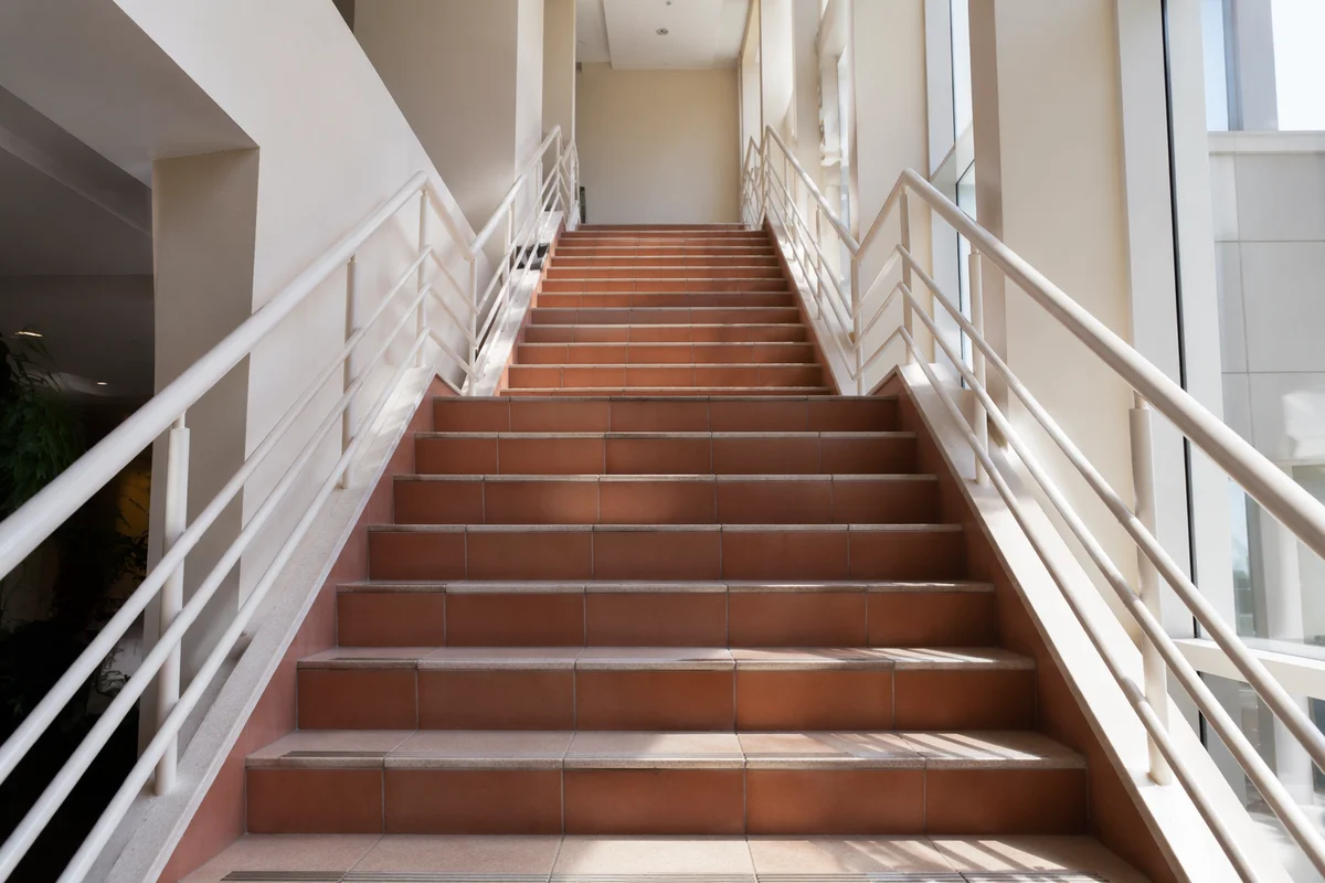 Ascending Staircase in Modern Office Interior