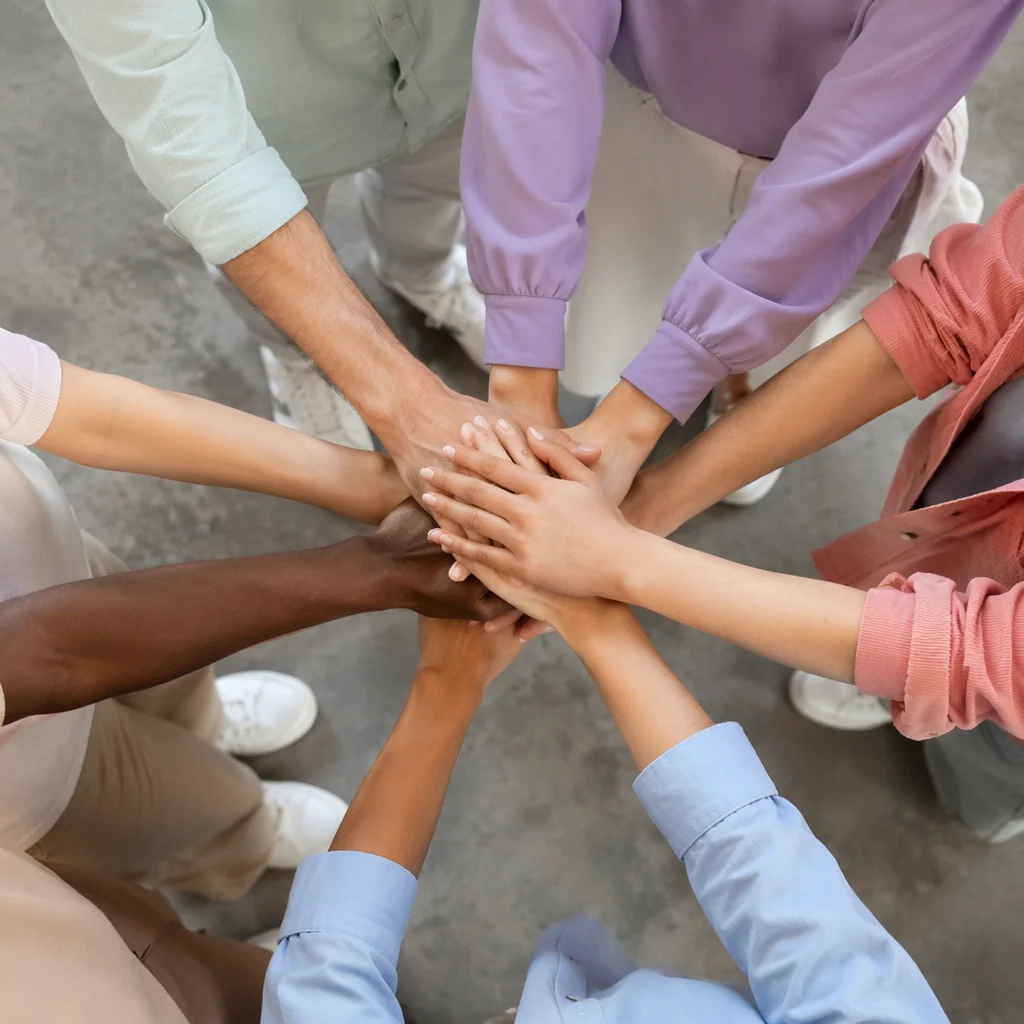 Overhead Team Hands Stacked for Unity