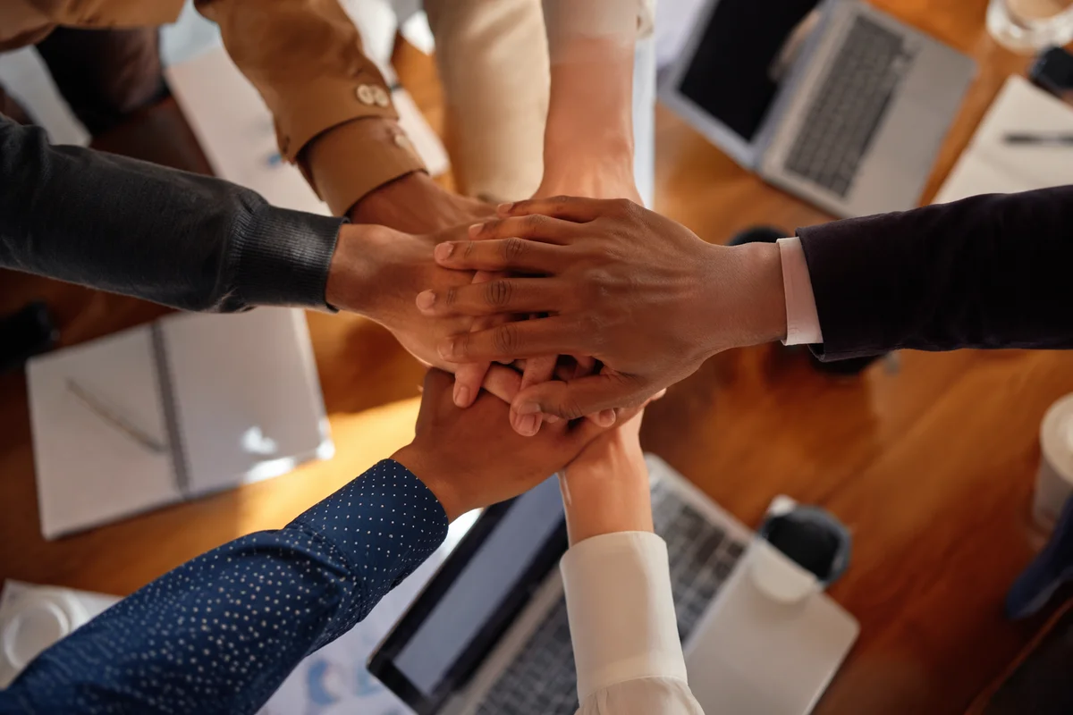 Diverse Business Team Hands in Unity