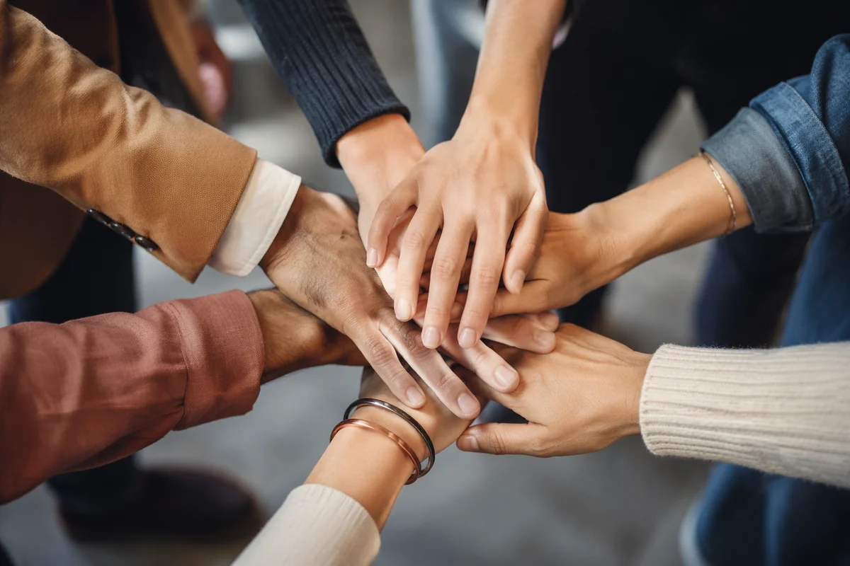Diverse Team Hands United in Collaboration