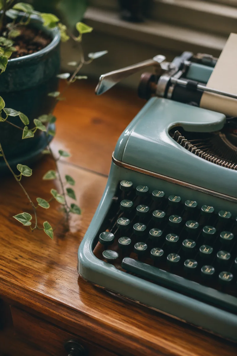 Vintage Typewriter on Wooden Desk Workspace