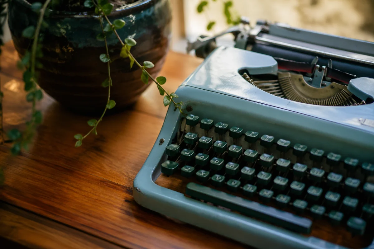 Vintage Typewriter on Wooden Desk Workspace