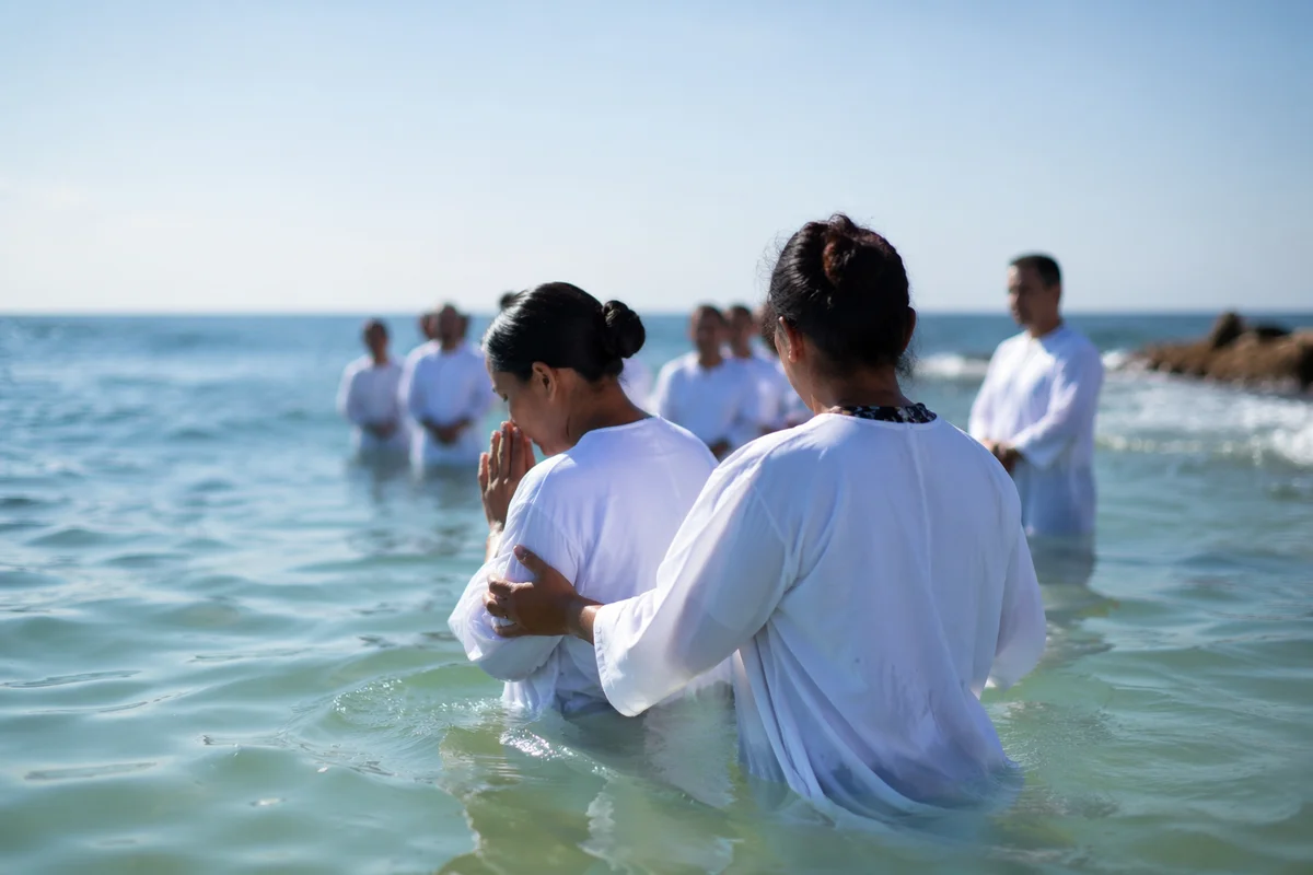 Coastal Baptism in White Robes