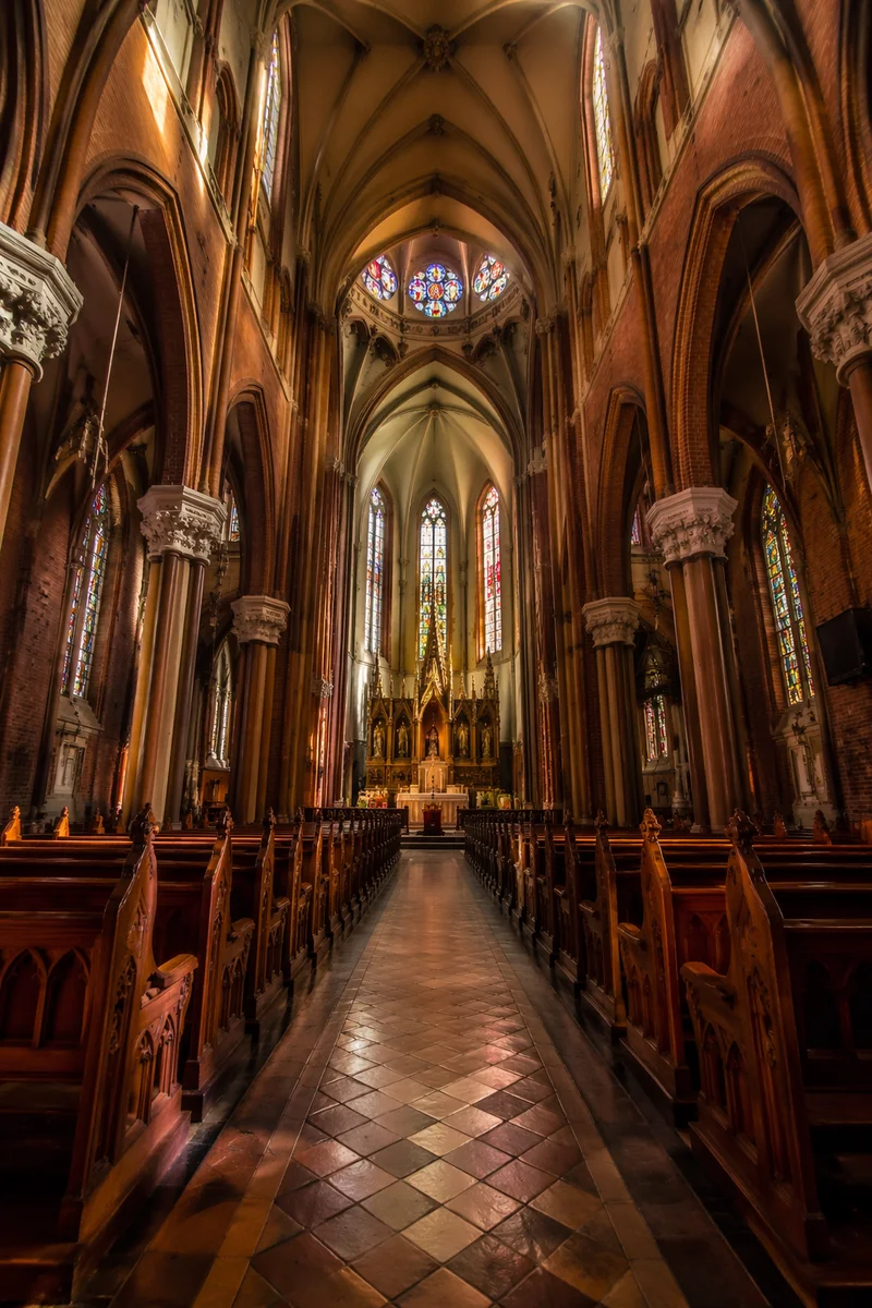Historic Church Aisle Toward Ornate Altar