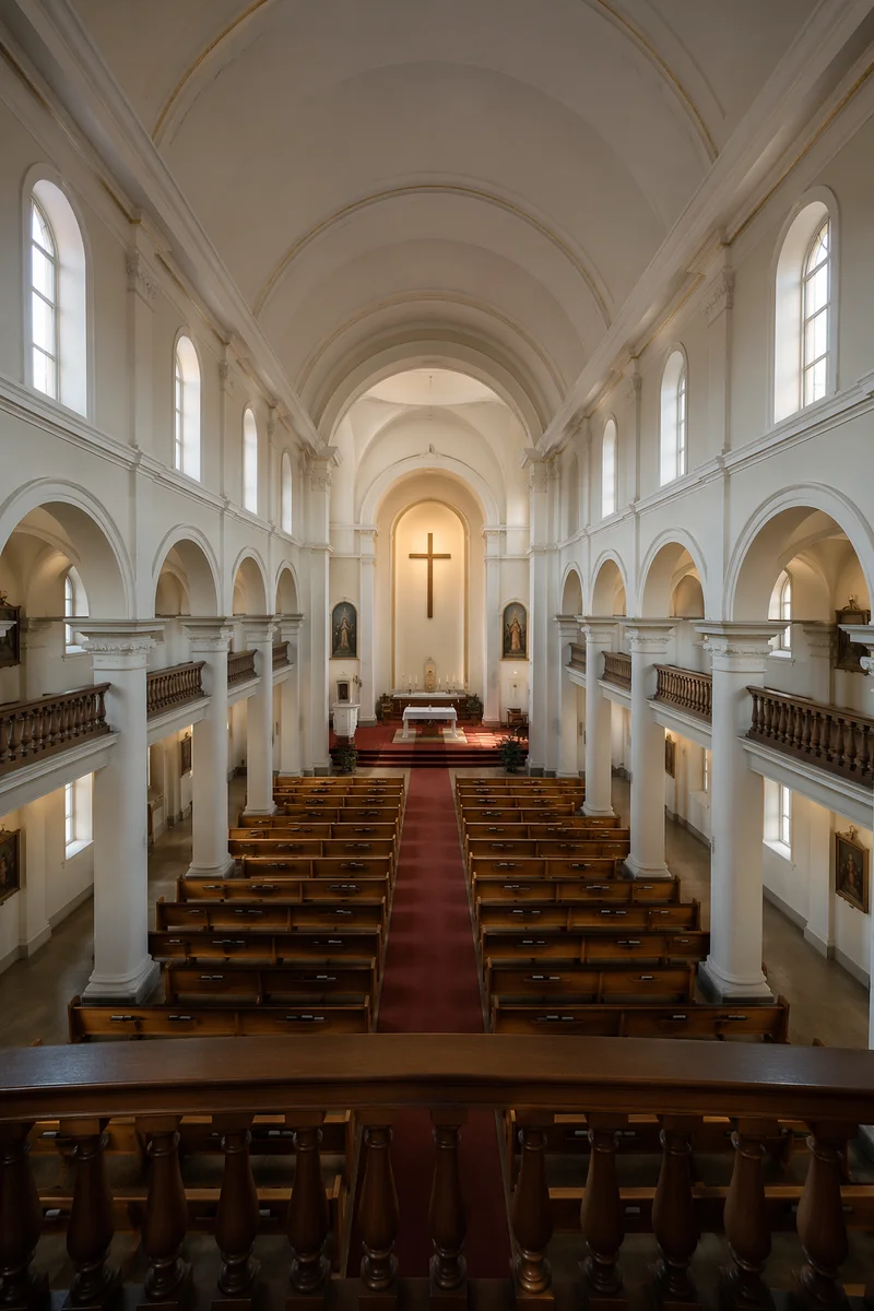 Serene Church Aisle Toward Altar Cross
