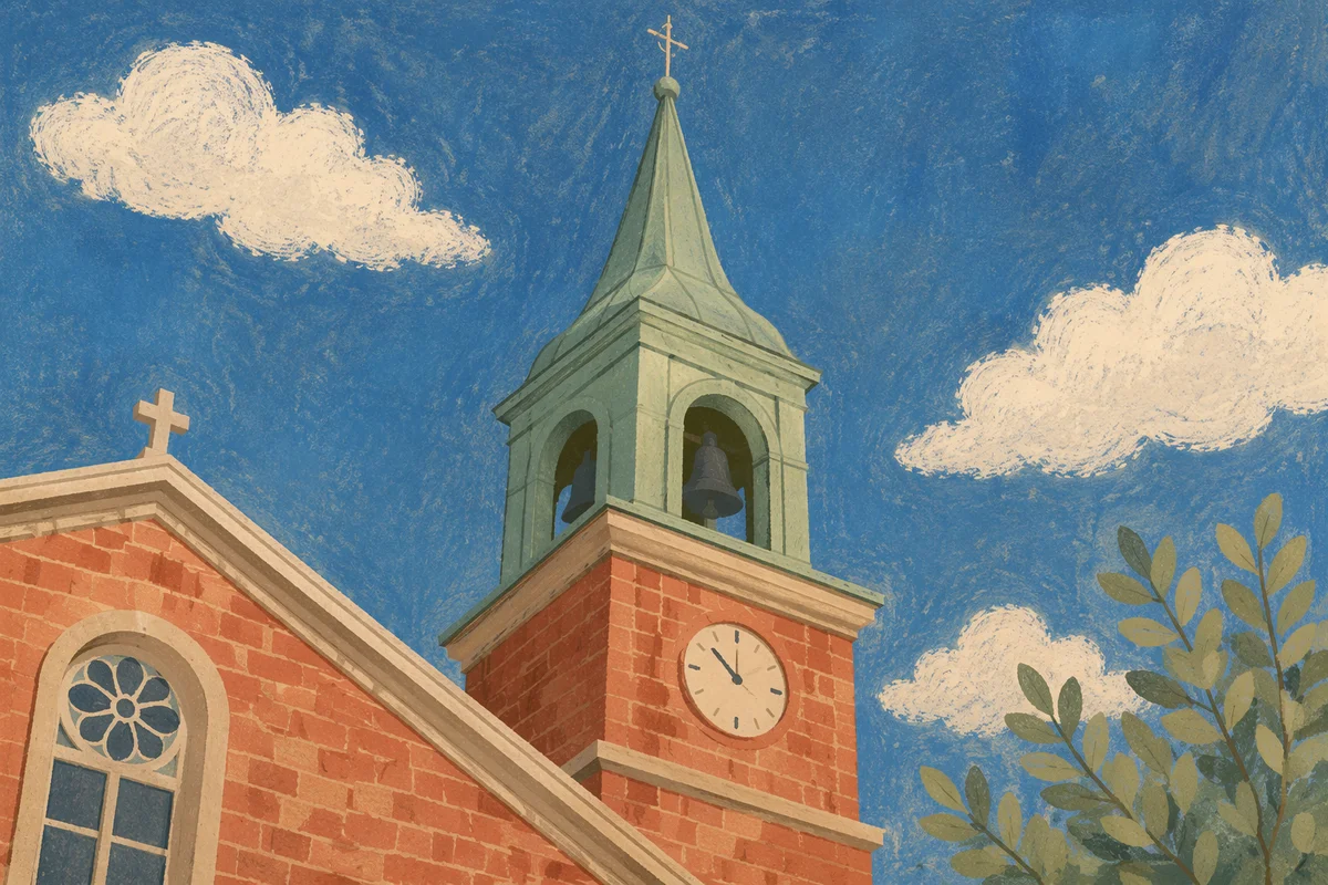 Historic Church Bell Tower Under Blue Sky
