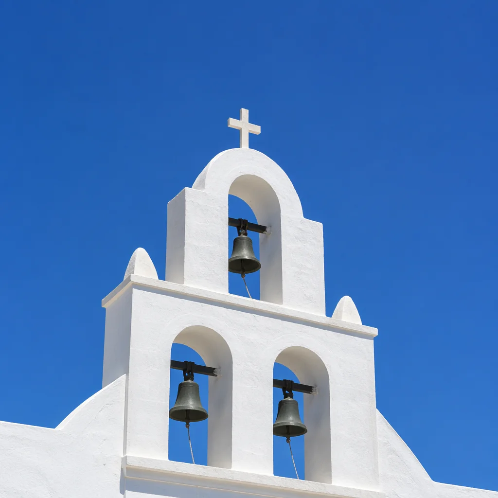 White Church Bell Tower Under Blue Sky