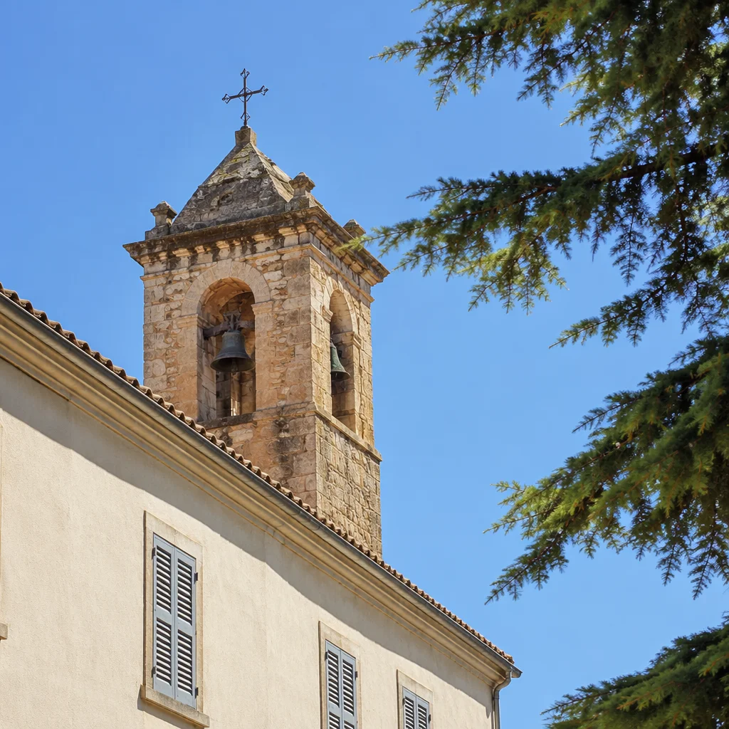 Historic Church Bell Tower Under Blue Sky