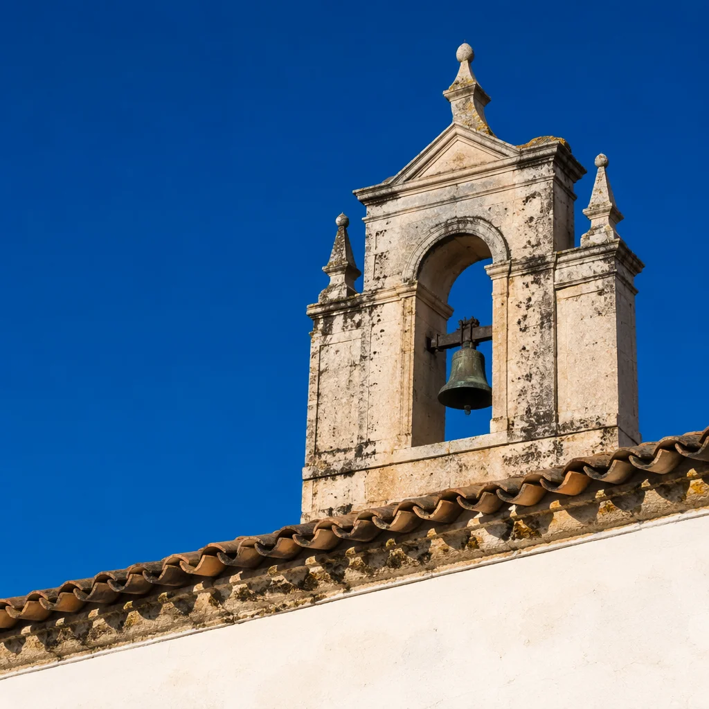 Historic Church Bell Tower Under Cobalt Sky