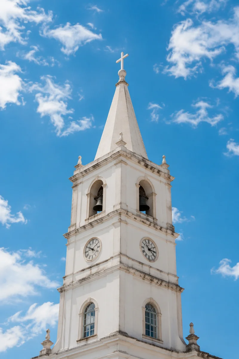 White Church Bell Tower Under Blue Sky