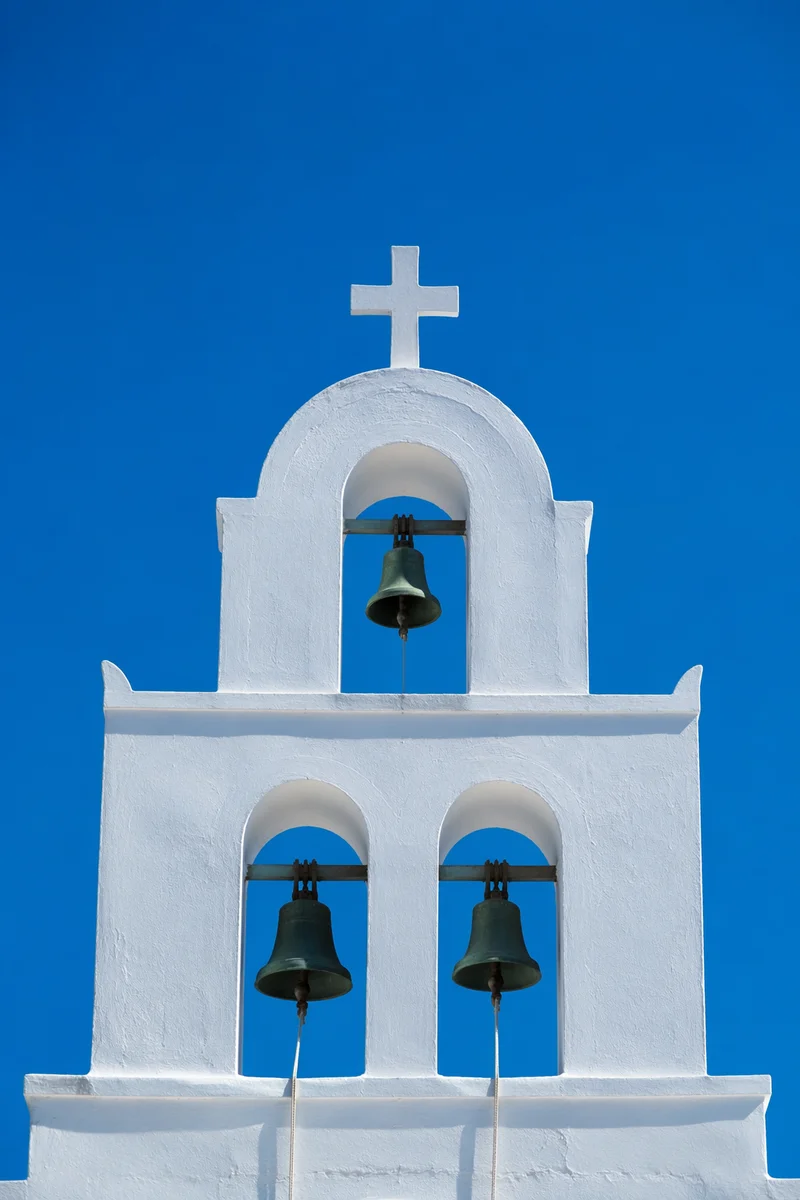 White Church Bell Tower Under Blue Sky