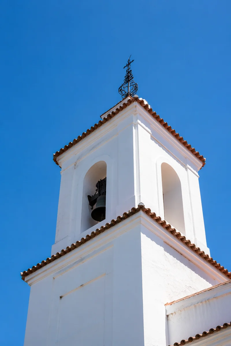 White Church Bell Tower Under Blue Sky