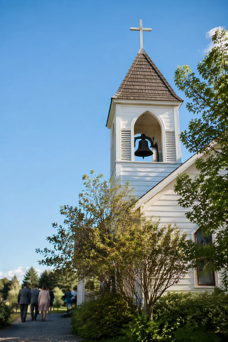 White Church Bell Tower Under Blue Sky