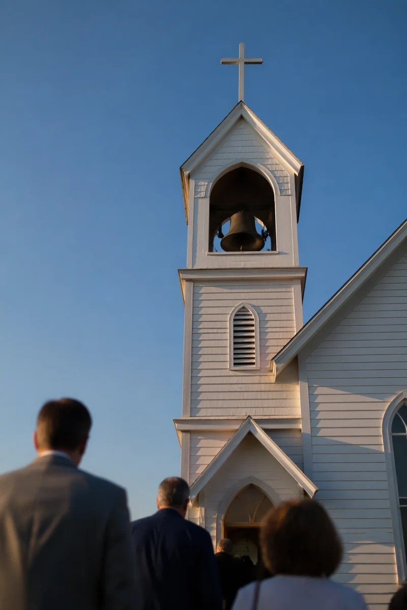 White Church Bell Tower Under Blue Sky