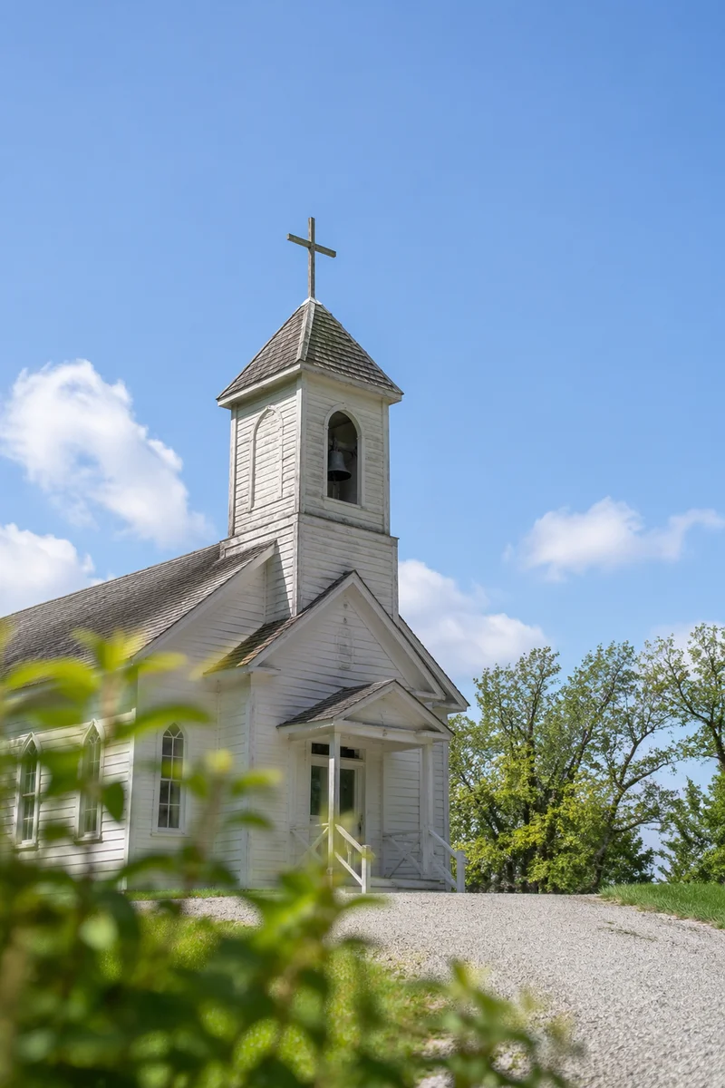 Modest Church Bell Tower Under Blue Sky